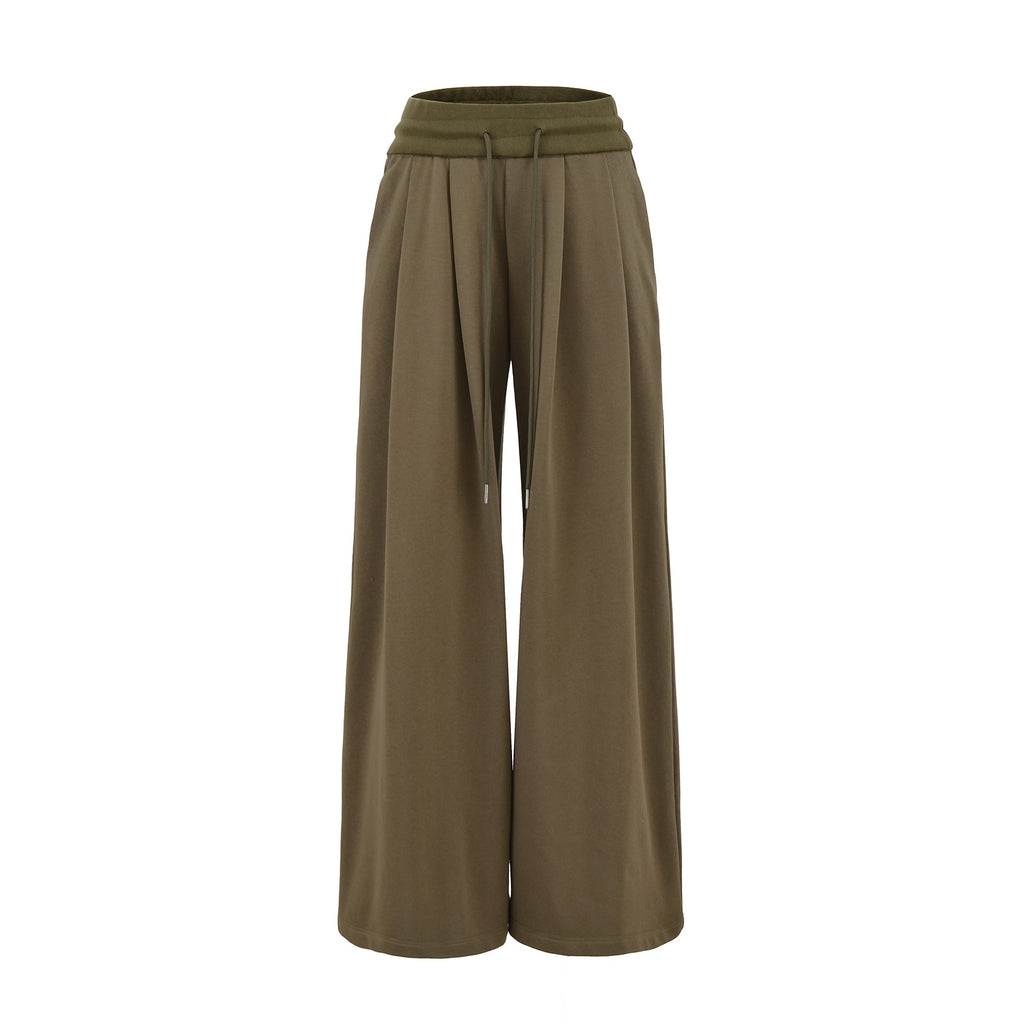 High waisted wide legged floor hugging sports pants